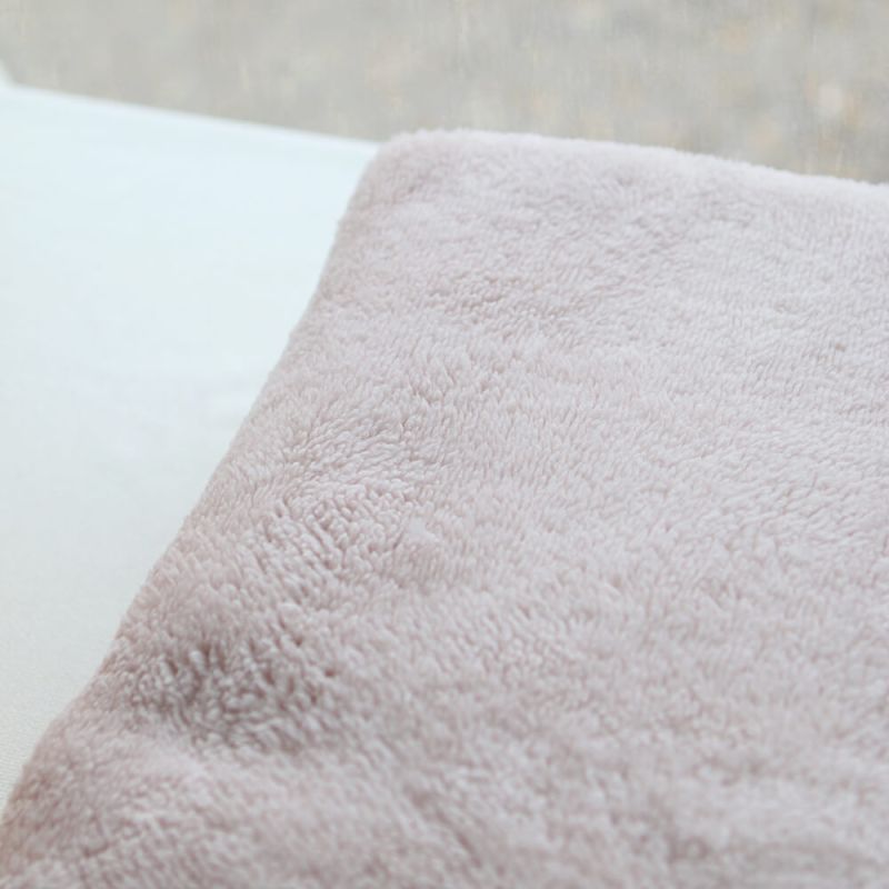 Teddy / moumoute bouclé coloris rose poudré