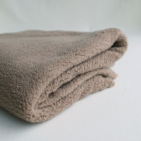 Teddy / moumoute bouclé coloris taupe