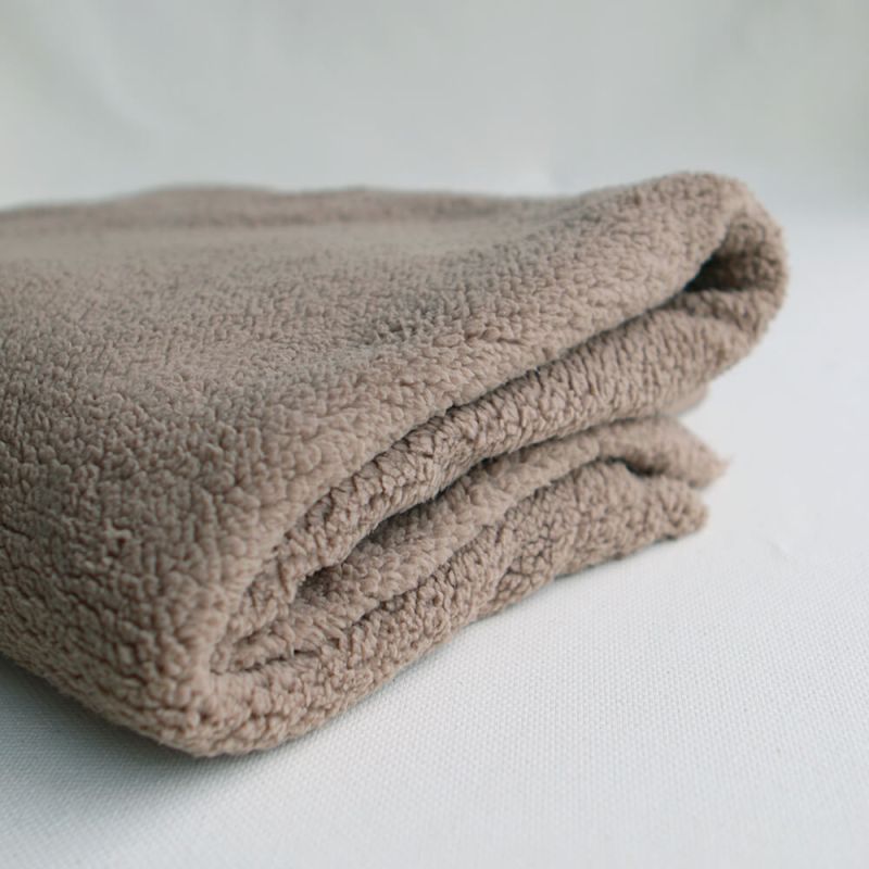 Teddy / moumoute bouclé coloris taupe