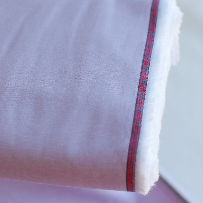 Popeline coton uni chiné effet chambray parme