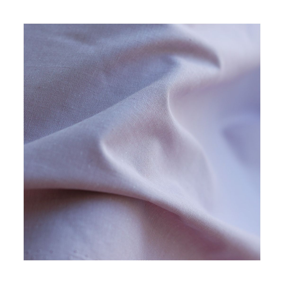 Popeline coton uni chiné effet chambray parme