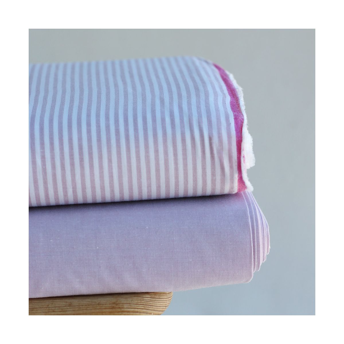 Popeline coton uni chiné effet chambray parme