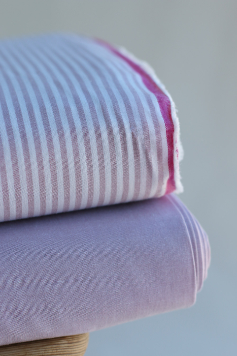 Popeline coton uni chiné effet chambray parme