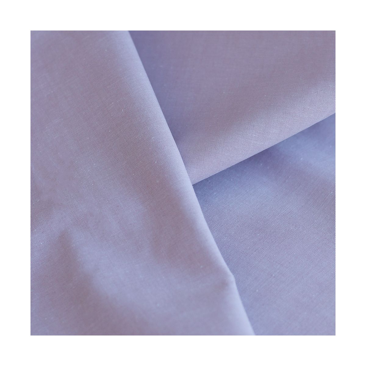 Popeline coton uni chiné effet chambray parme