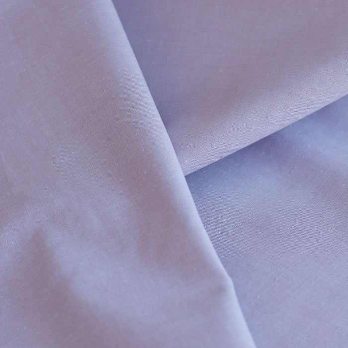 Popeline coton uni chiné effet chambray parme