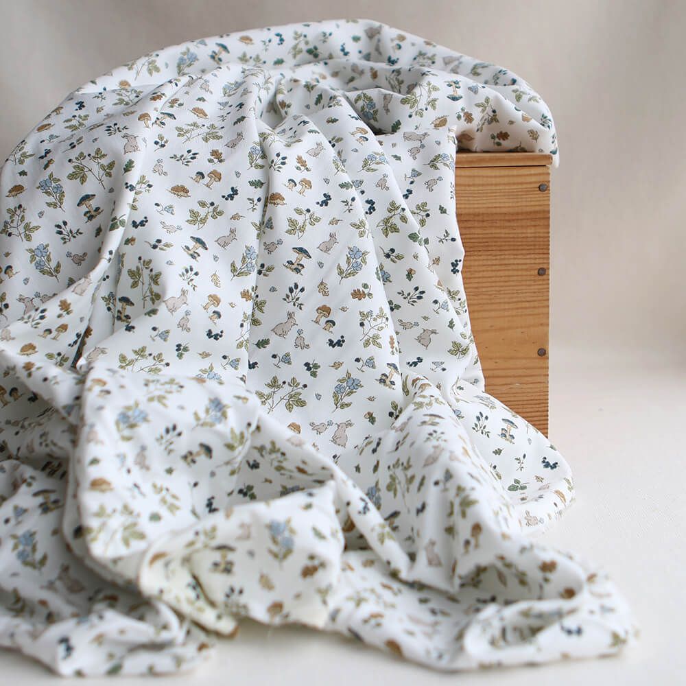 Mousse - Tissu coton texturé imprimé animaux de la forêt bleu