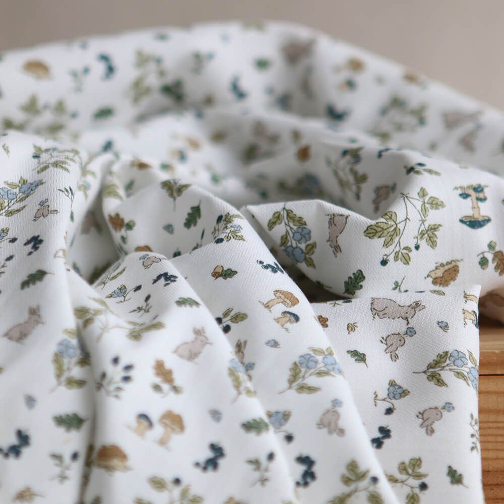 Mousse - Tissu coton texturé imprimé animaux de la forêt bleu