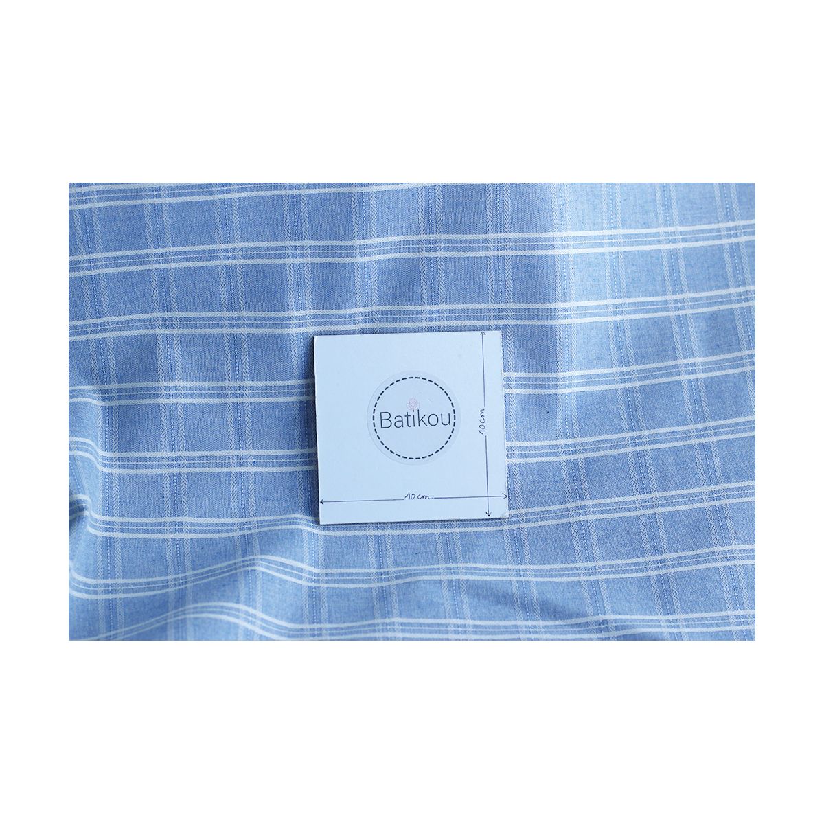 Tissu coton et viscose texturé quadrillage blanc et bleu nuage