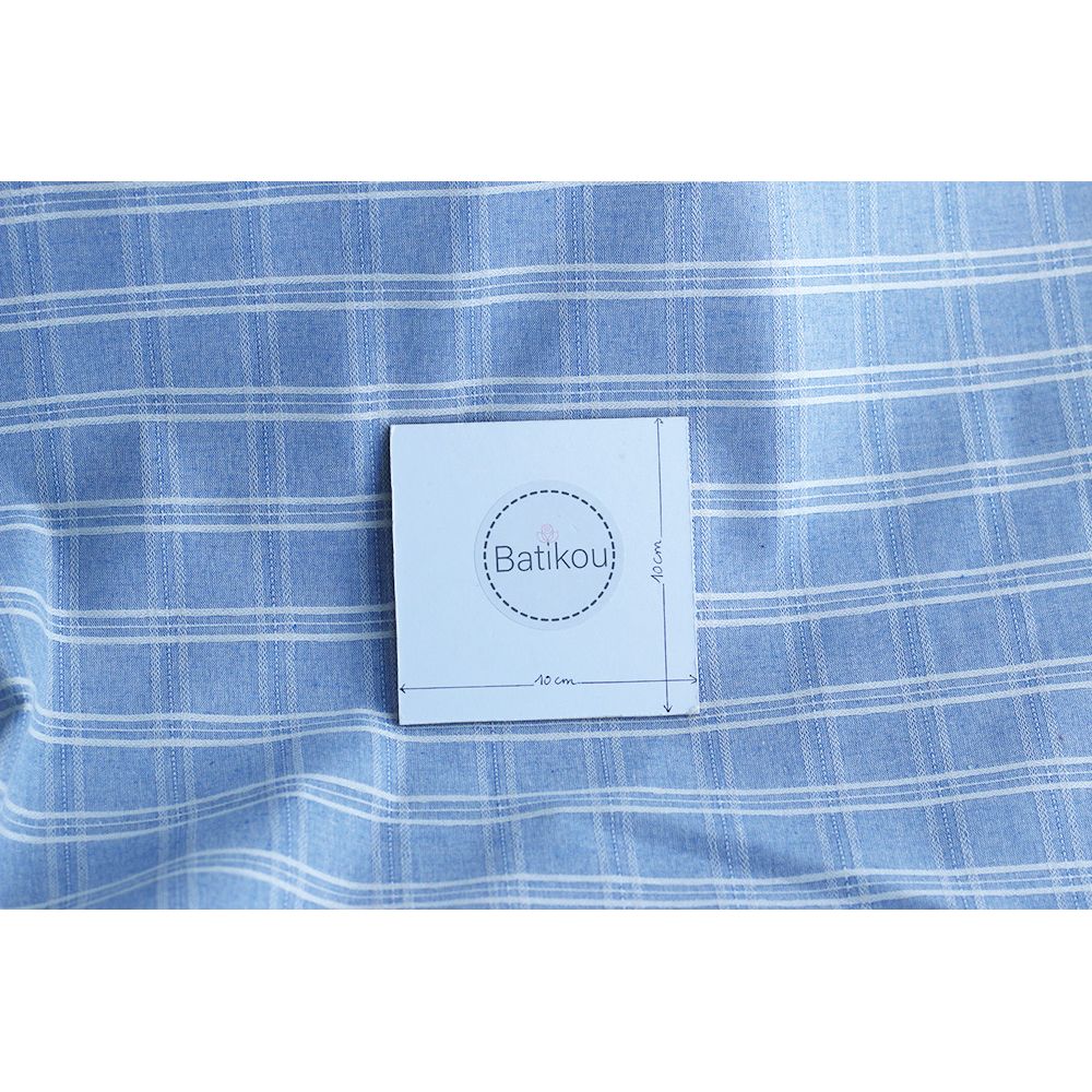 Tissu coton et viscose texturé quadrillage blanc et bleu nuage