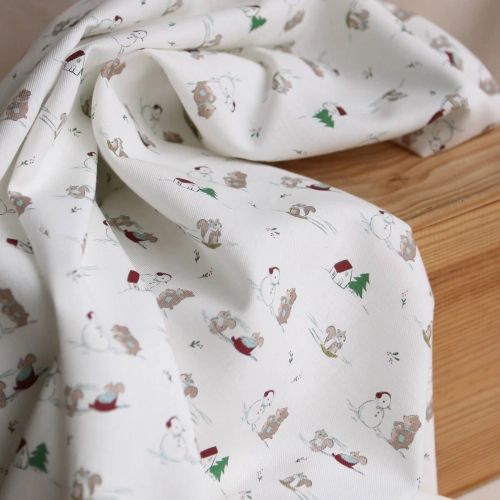 Tissu sergé de coton organique imprimé personnages d'hiver