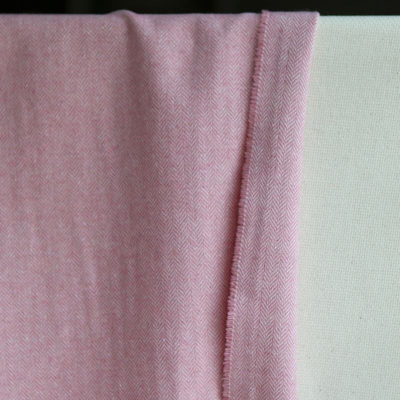 Tissu chevrons texturé coton / laine coloris Rose tendre