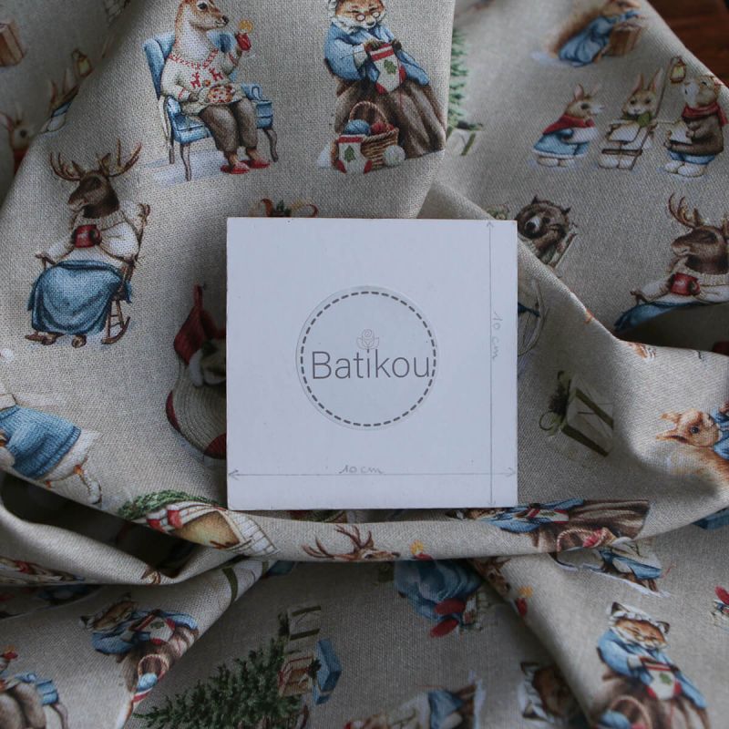 Toile de coton canvas motif animaux de noël fond beige