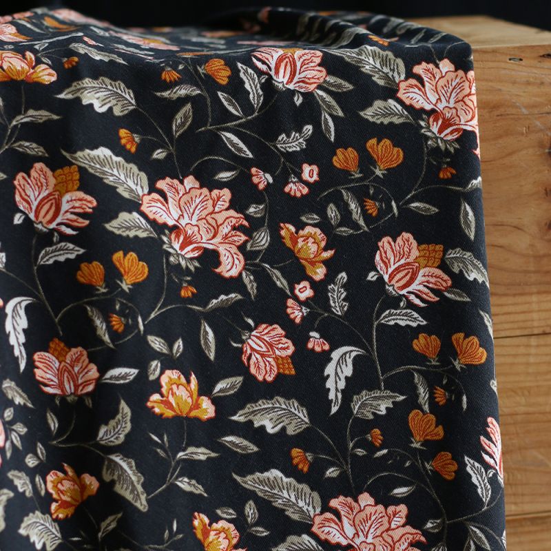 Jersey bambou coton à motif fleuri automne fond noir