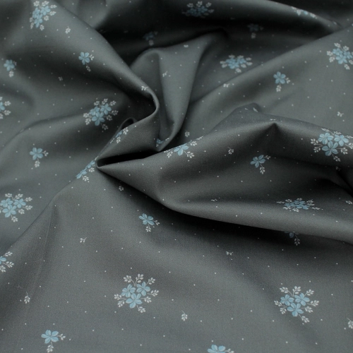 Coton satiné motif Beth exclusif Batikou fond pois gris étain x1m