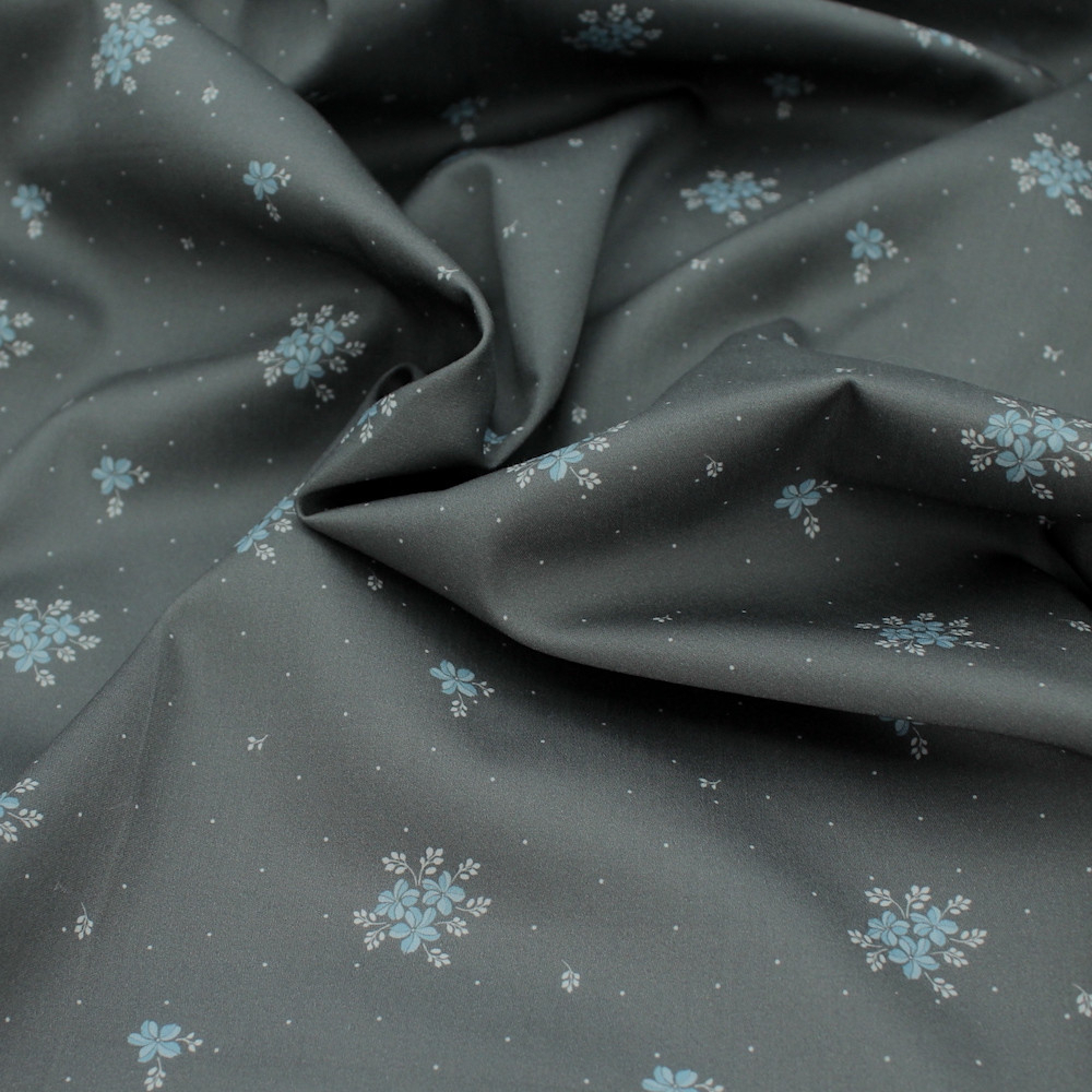 Coton satiné motif Beth exclusif Batikou fond pois gris étain x1m