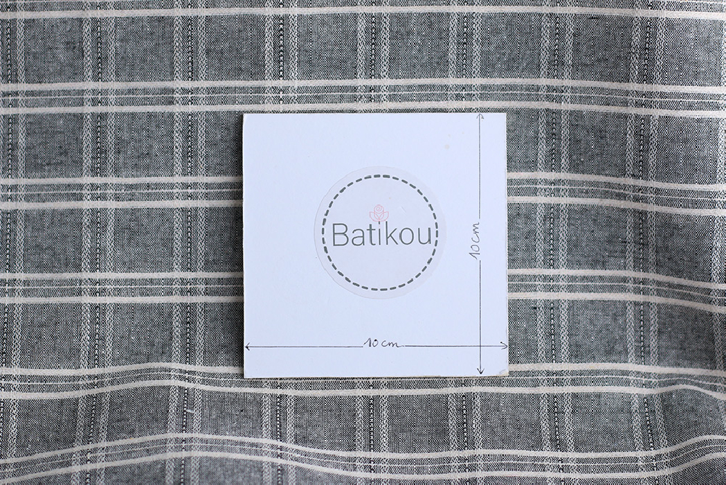 Tissu coton et viscose texturé quadrillage blanc et noir