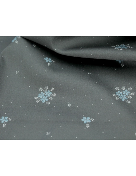 Coton satiné motif Beth exclusif Batikou fond pois gris étain x1m