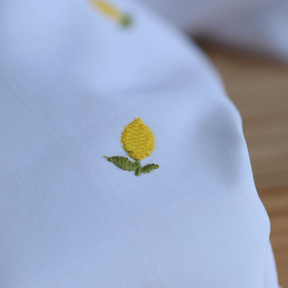 Basile - Voile de coton blanc broderies petits citrons