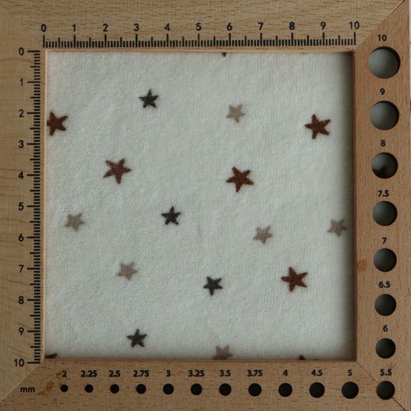 Stars - Velours de coton Nicky fond blanc lait motif étoiles marron