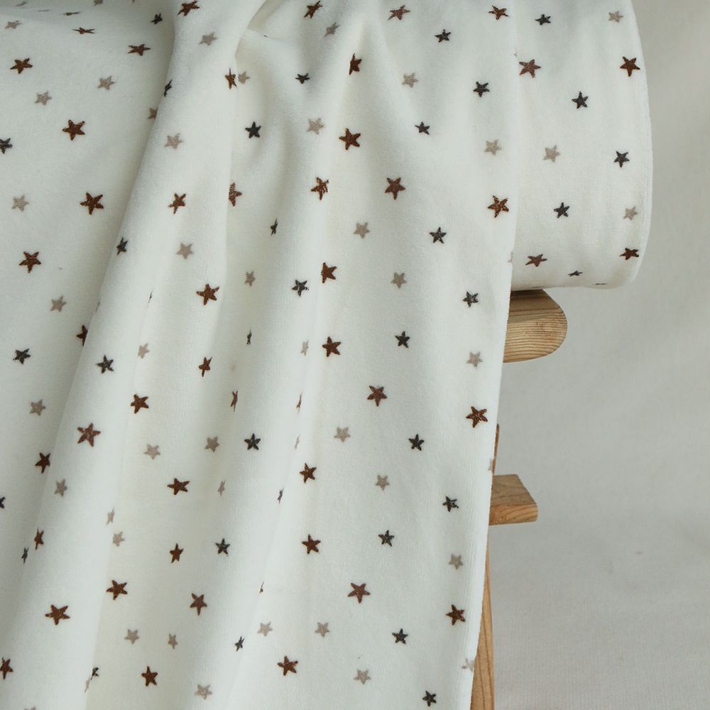 Stars - Velours de coton Nicky fond blanc lait motif étoiles marron
