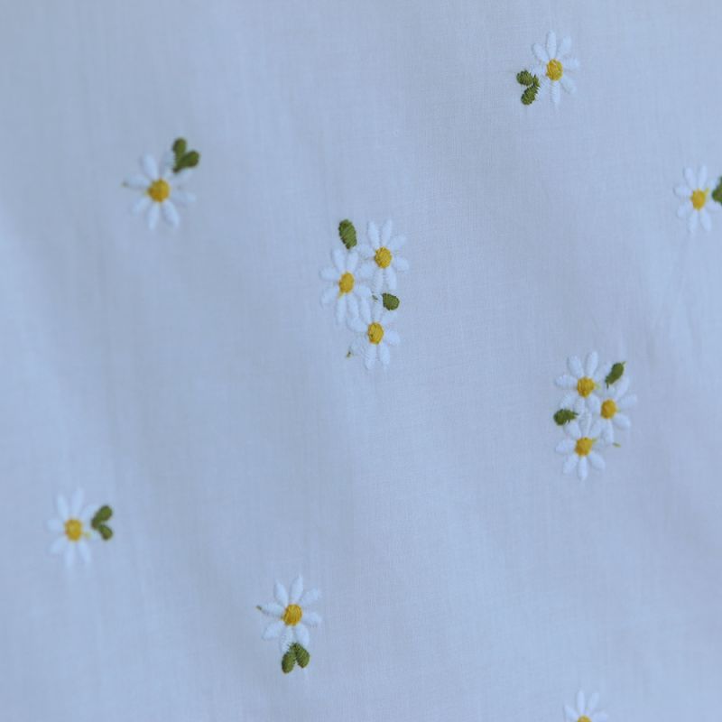 Daphné - Voile de coton blanc broderies marguerites