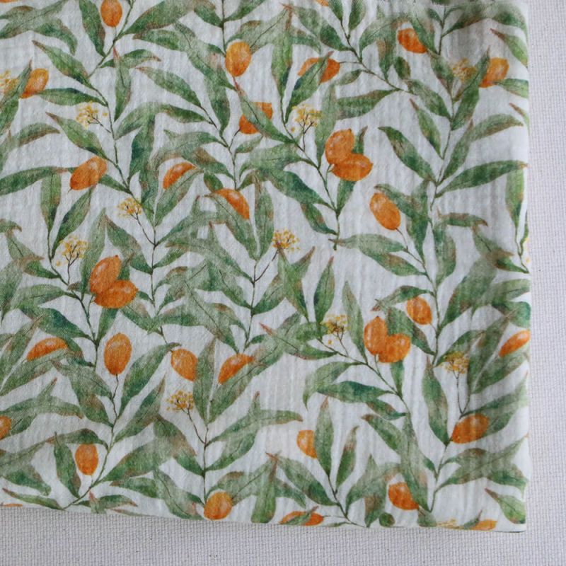 Zestine - Double gaze de coton motif feuillage et agrumes