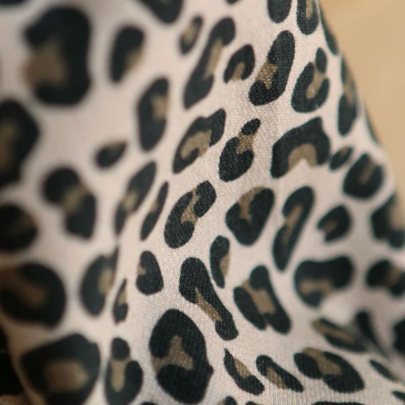 Lea - Tissu sweat graou noir et noisette fond nude