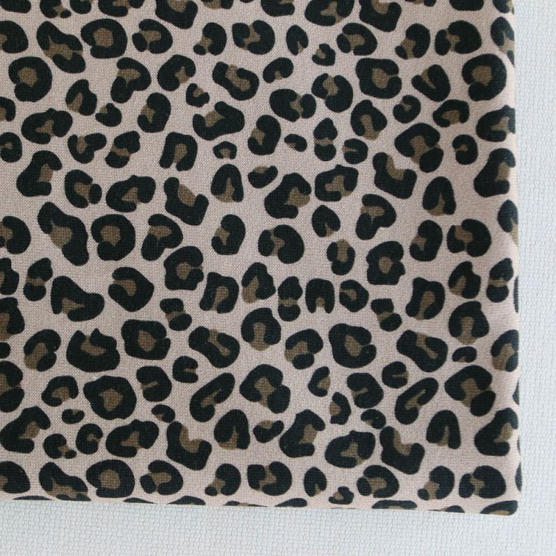 Lea - Tissu sweat graou noir et noisette fond nude