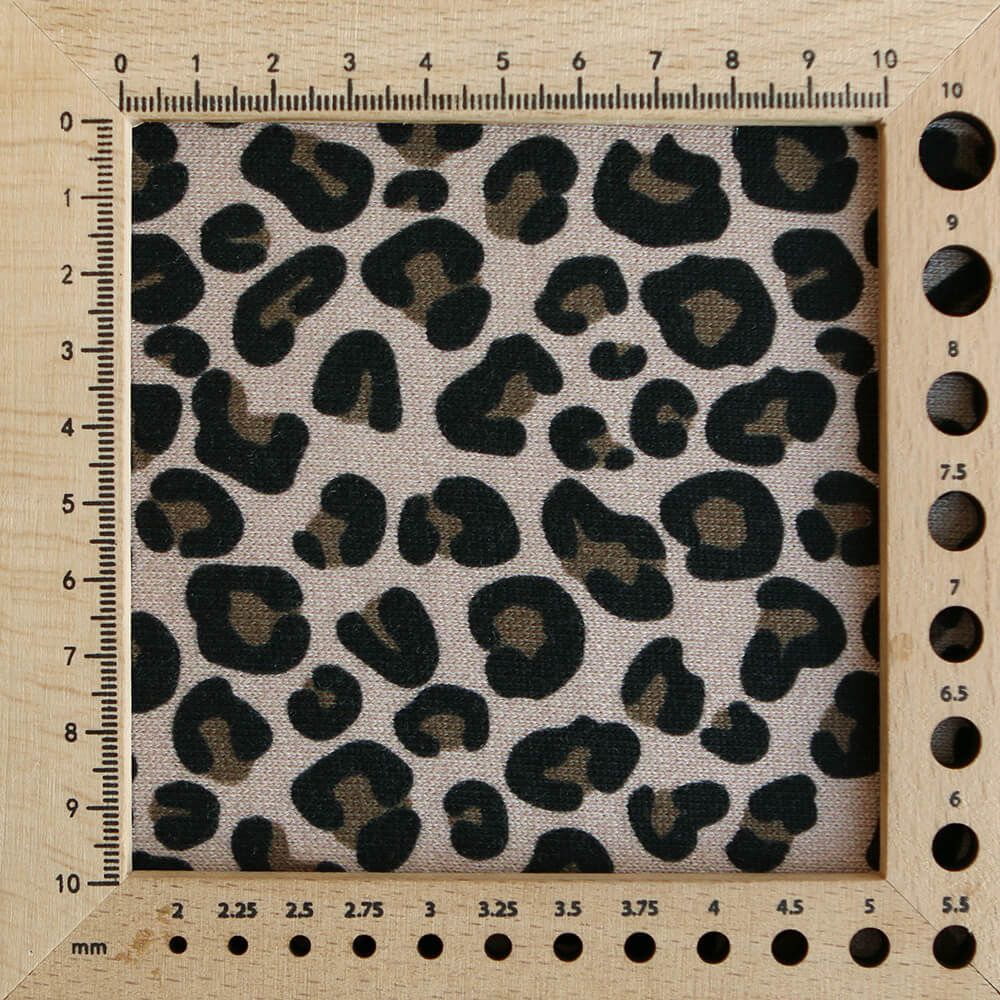 Lea - Tissu sweat graou noir et noisette fond nude