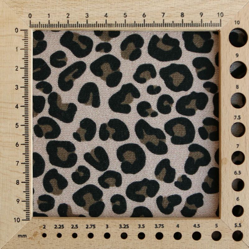 Lea - Tissu sweat graou noir et noisette fond nude