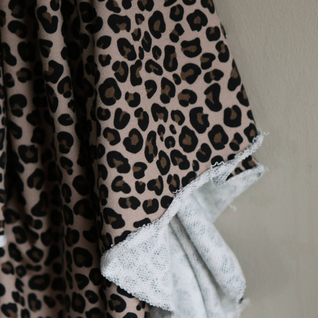 Lea - Tissu sweat graou noir et noisette fond nude