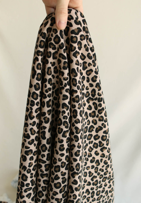 Lea - Tissu sweat exclusif graou noir et châtaigne fond beige poudré