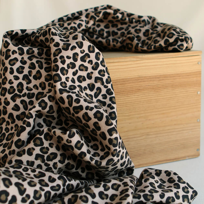 Lea - Tissu sweat exclusif graou noir et châtaigne fond beige poudré