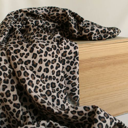 Lea - Jersey coton bio motif exclusif graou noir et brun châtaigne fond beige poudré