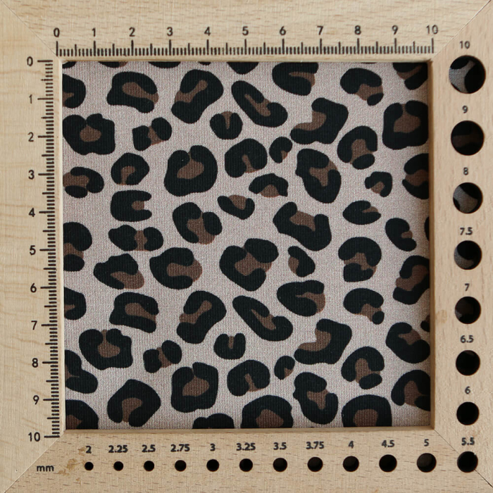 Lea - Jersey coton bio motif exclusif graou noir et brun châtaigne fond beige poudré