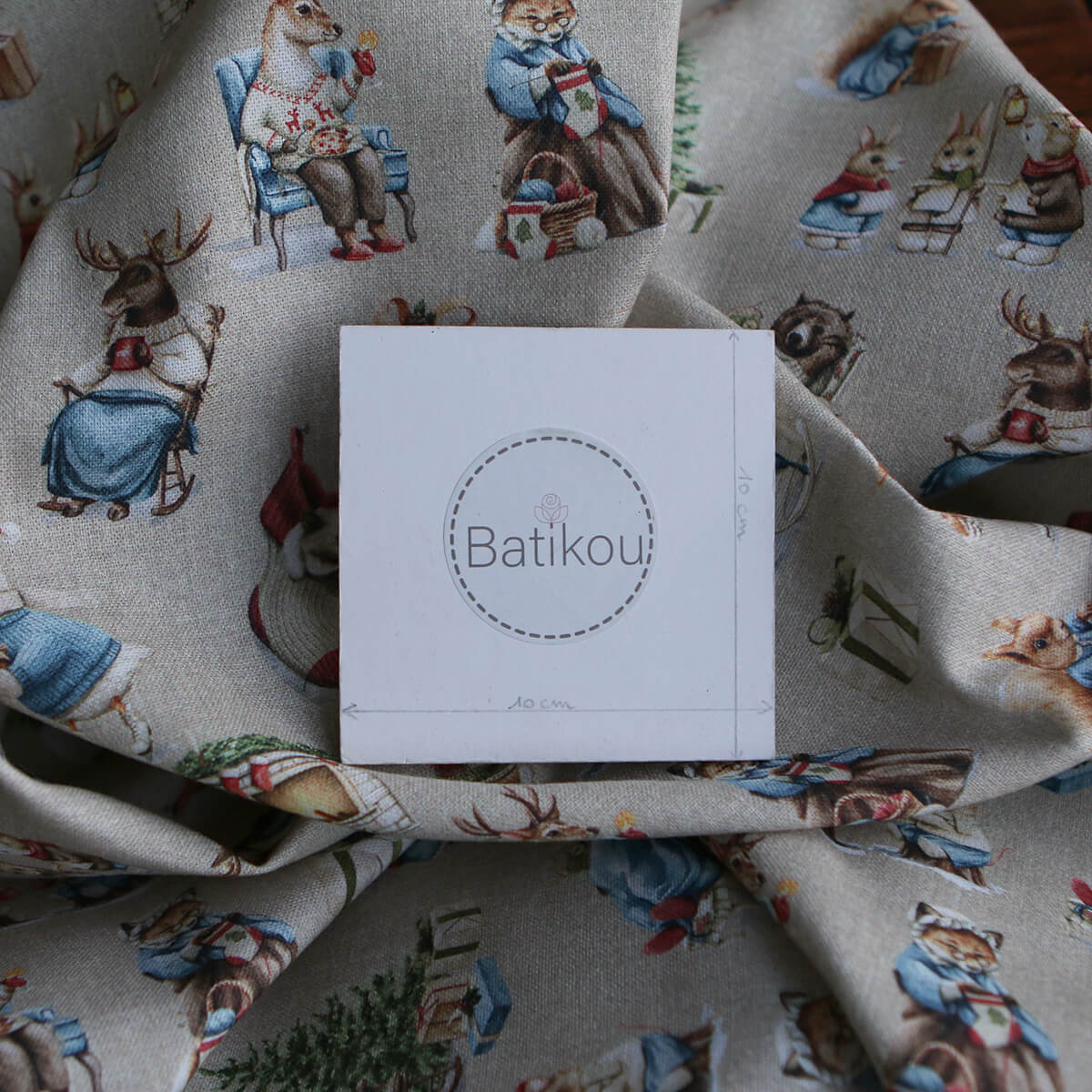 Toile de coton canvas motif animaux de noël fond beige