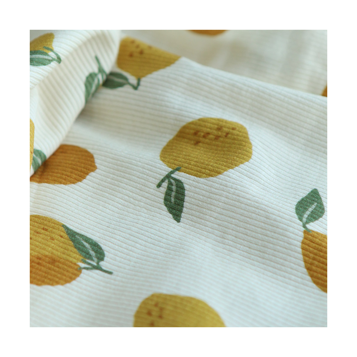 Jersey coton côtes fines à motif citrons jaunes