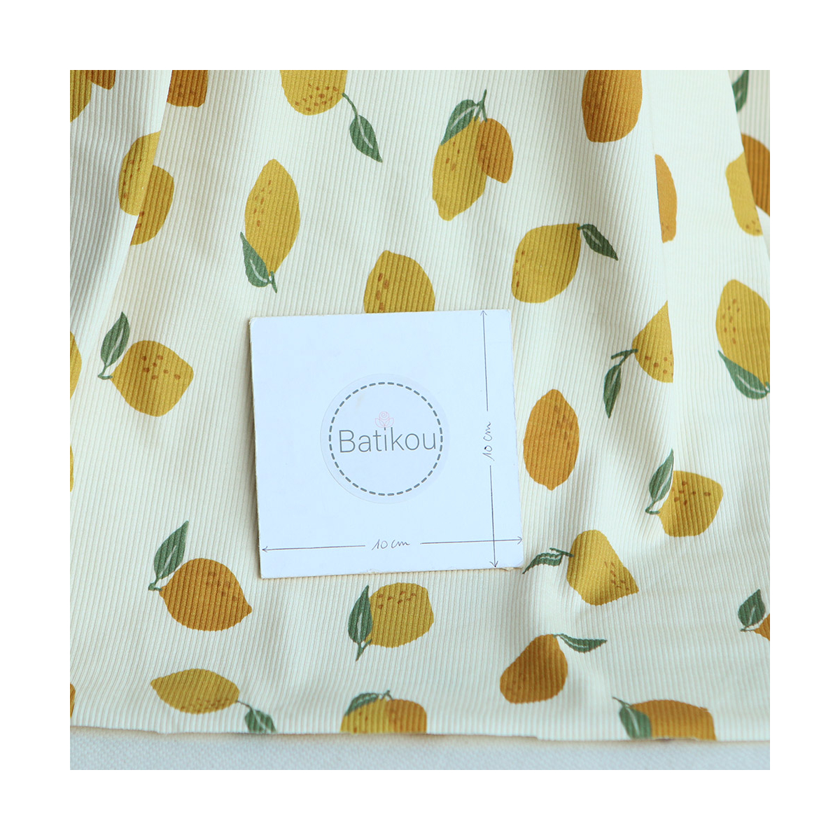 Jersey coton côtes fines à motif citrons jaunes