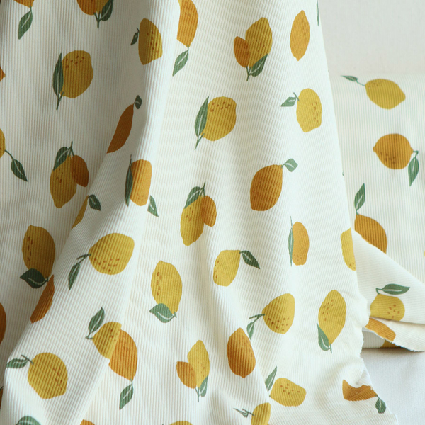 Jersey coton côtes fines à motif citrons jaunes