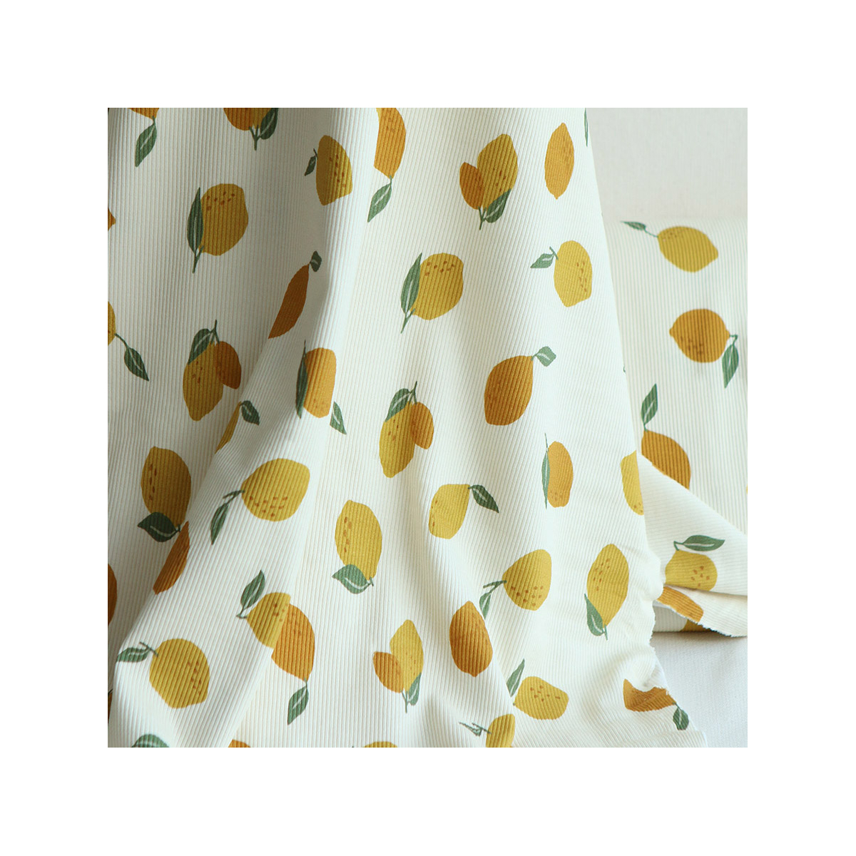 Jersey coton côtes fines à motif citrons jaunes