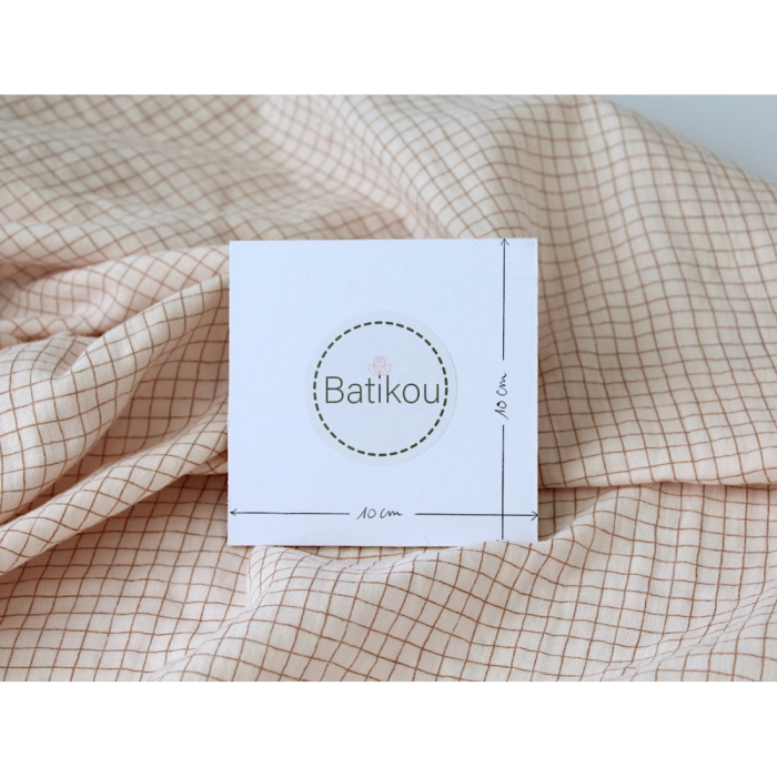 Double gaze de coton rose poudré à petits carreaux