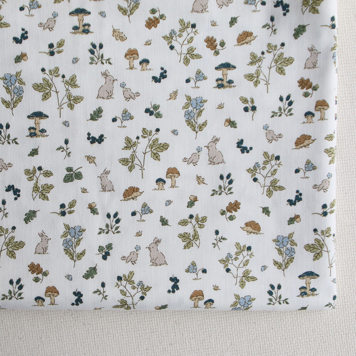 Mousse - Tissu coton texturé imprimé animaux de la forêt bleu