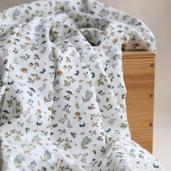 Mousse - Tissu coton texturé imprimé animaux de la forêt bleu