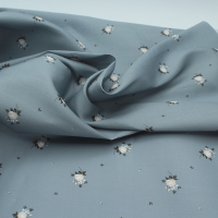 Coton satiné motif Lily exclusif Batikou fond bleu grisé