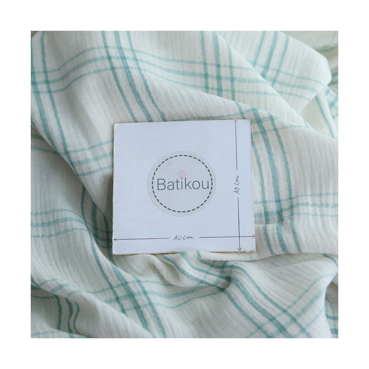 Double gaze de coton ivoire carreaux aqua