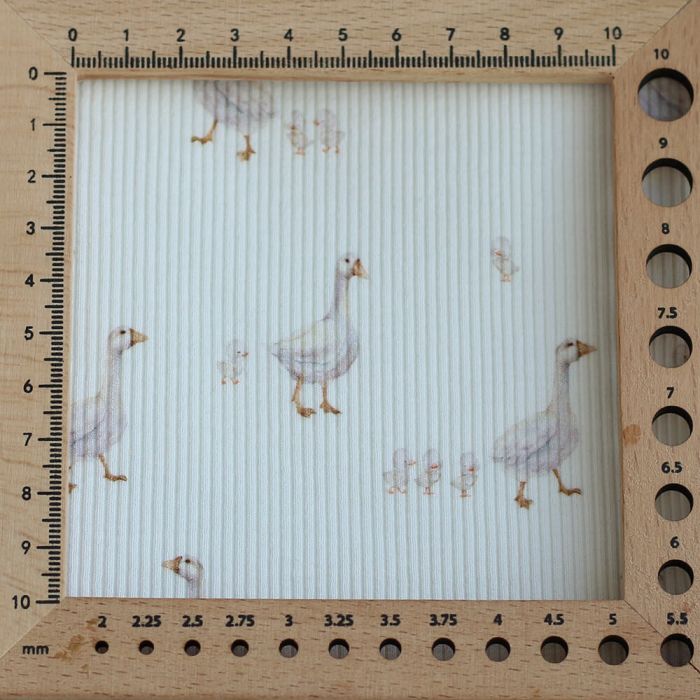 Jersey coton côtes fines à motifs petites oies fond lait