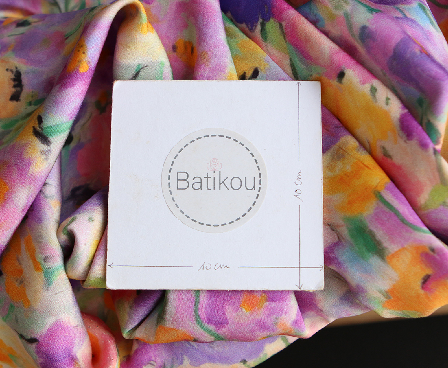 Emna - Viscose satinée imprimé fleuri parme