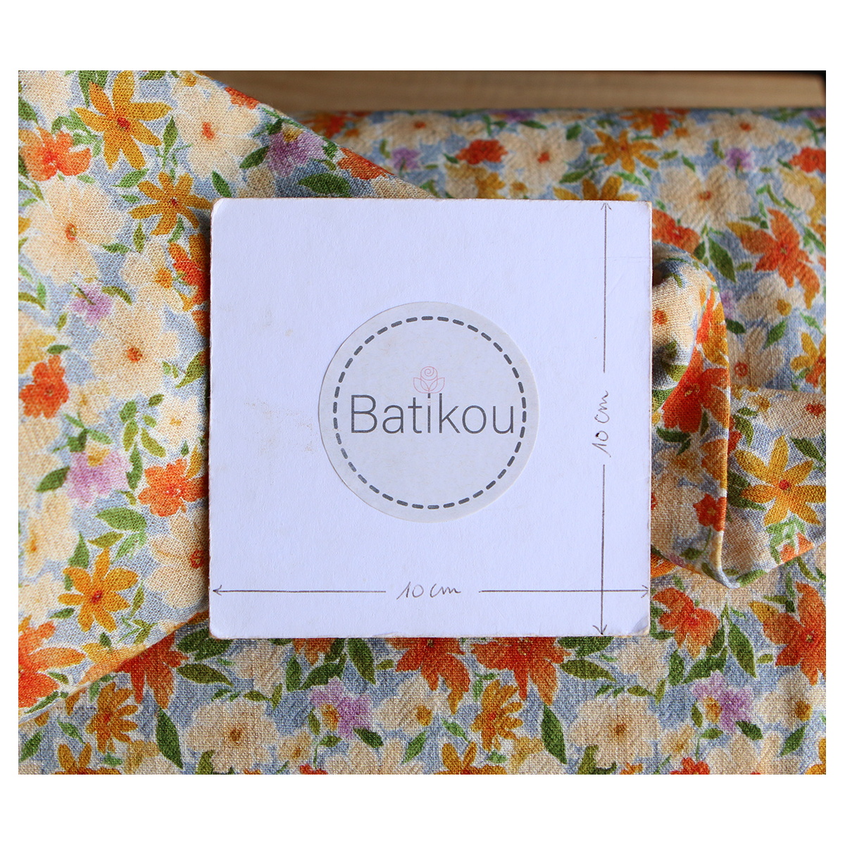 Crêpe lin et viscose imprimé fleuri orangé