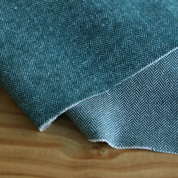 Tissu chevrons texturé coton / laine coloris Pétrole