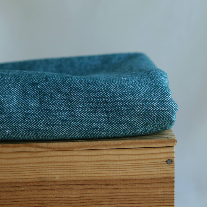 Tissu chevrons texturé coton / laine coloris Pétrole